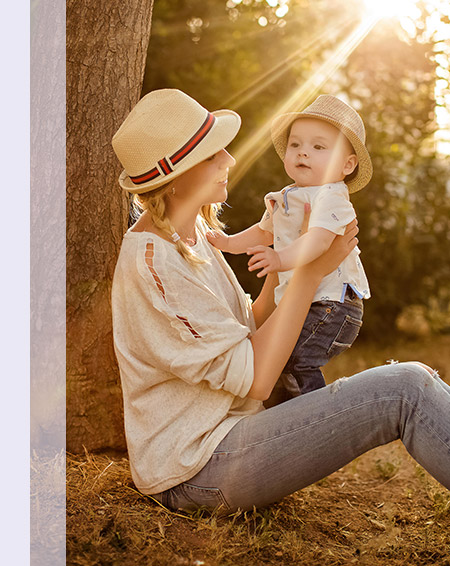 mother holding baby